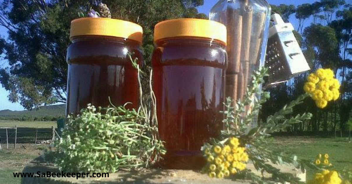 two honey jars of  darker "fynbos" honey in south africa